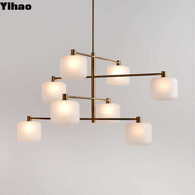Chiếc đèn chùm treo thân bằng đồng Yihao với đèn LED màu trắng ấm 2700K và tuổi thọ 50.000 giờ cho phòng khách